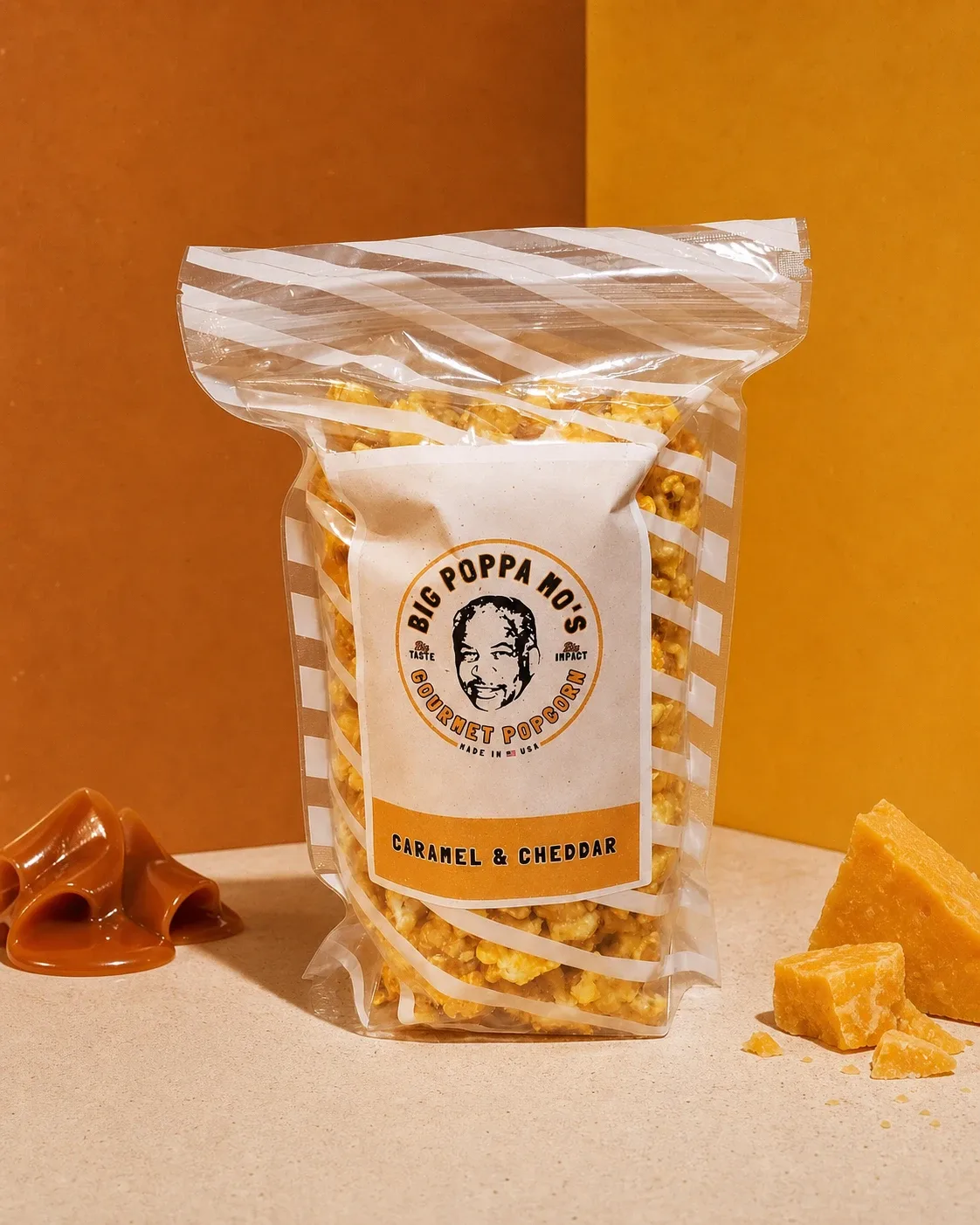 Caramel and Cheddar gourmet popcorn in a Big Poppa Mo’s pouch