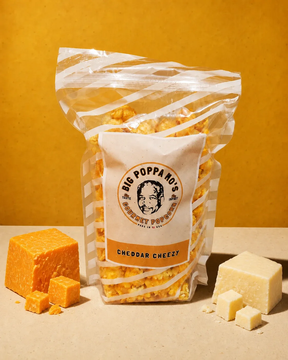 Cheddar Cheezy gourmet popcorn in a Big Poppa Mo’s pouch