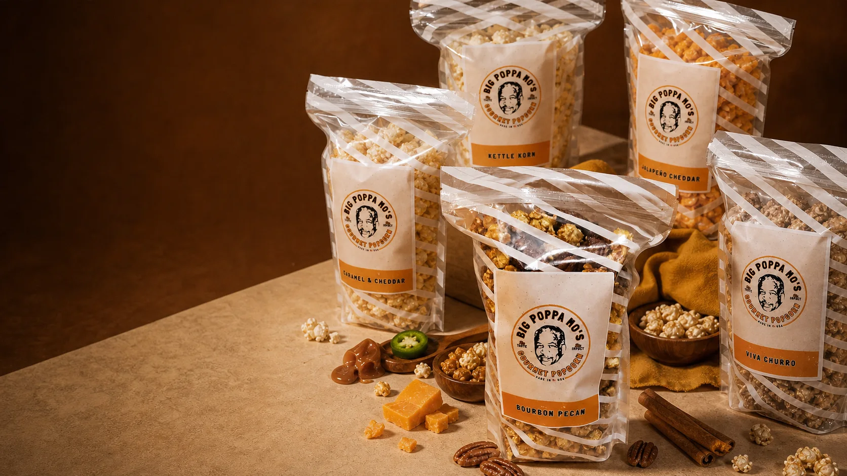 An assortment of Big Poppa Mo’s gourmet popcorn bags arranged together