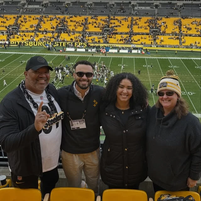 Don and Shontelle with family at a Pittsburgh Steelers game